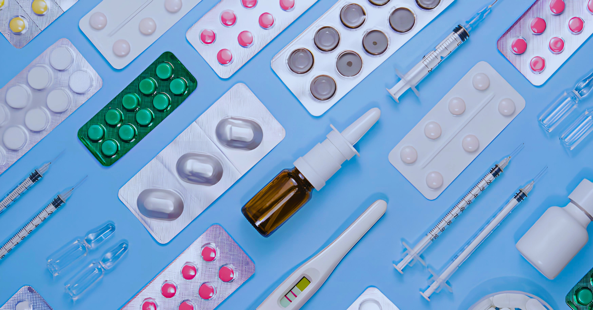 Blister packs of medications, bottles of drops, and medical devices.